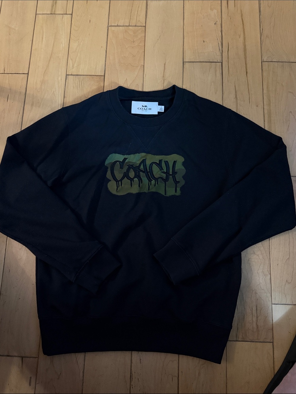 Costume Black Crewneck Sweatshirt with Olive Logo